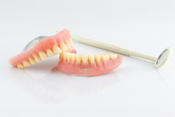 Implant Retained Dentures For Better Chewing Function
